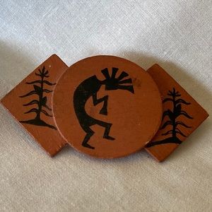 Signed pin with corn stalk and Kokopelli. Hopi?